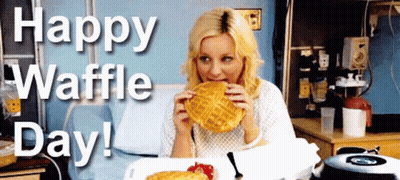 A Woman In A Hospital Bed Eating A Waffle With The Words Happy Waffle Day GIF