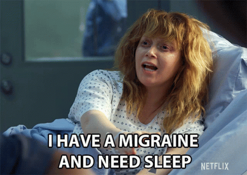 A Woman In A Hospital Bed With A Caption That Says I Have A Migraine And Need Sleep GIF
