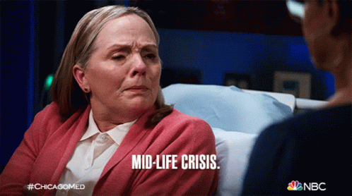 A Woman In A Hospital Bed With The Words Mid-Life Crisis Written On Her Face GIF