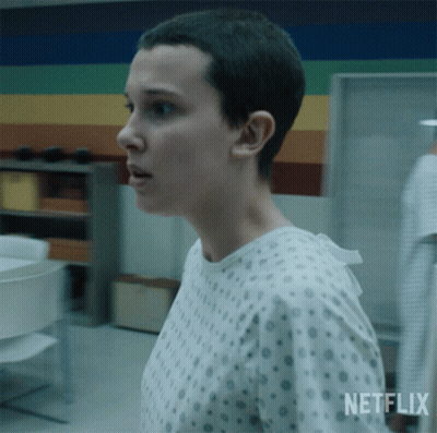 A Woman In A Hospital Gown With The Word Netflix On The Bottom GIF