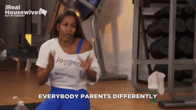 A Woman In A Joggers Shirt Is Sitting In A Gym And Says Everybody Parents Differently GIF