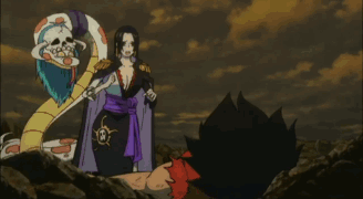 A Woman In A Kimono Is Standing Next To A Man Holding A Box GIF