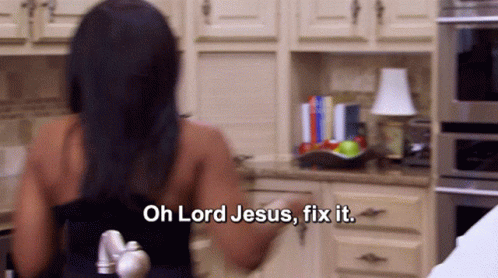 A Woman In A Kitchen With The Words Oh Lord Jesus Fix It GIF
