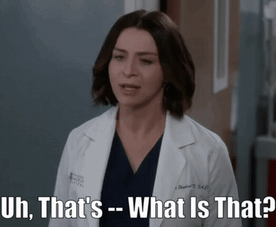 A Woman In A Lab Coat Is Asking " What Is That " GIF