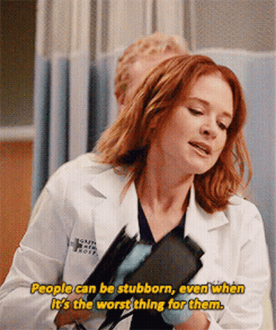A Woman In A Lab Coat Says People Can Be Stubborn Even When It Is The Worst Thing For Them GIF