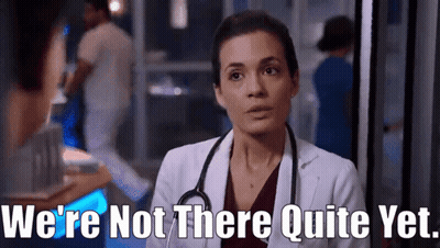 A Woman In A Lab Coat With A Stethoscope Around Her Neck Says We 'Re Not There Quite Yet GIF