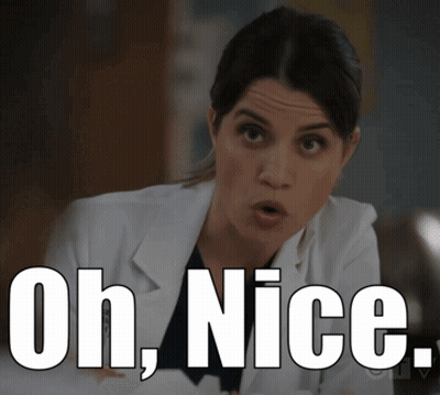 A Woman In A Lab Coat With The Words Oh Nice Above Her GIF