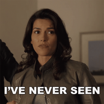 A Woman In A Leather Jacket Has The Words I 'Ve Never Seen Written Below Her GIF