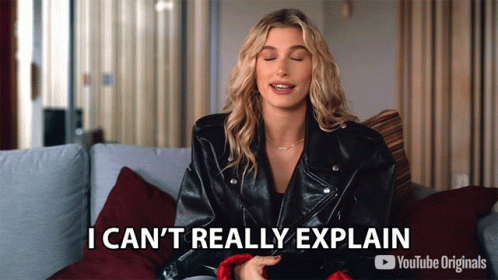 A Woman In A Leather Jacket Is Sitting On A Couch And Saying I Can 'T Really Explain GIF