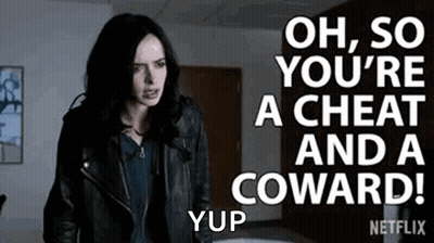 A Woman In A Leather Jacket Is Standing In A Room With A Netflix Logo On The Bottom . GIF