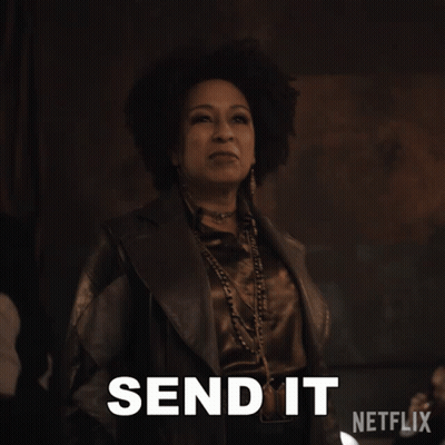 A Woman In A Leather Jacket Says Send It In White Letters GIF