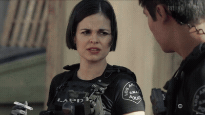 A Woman In A Los Angeles Police Uniform GIF