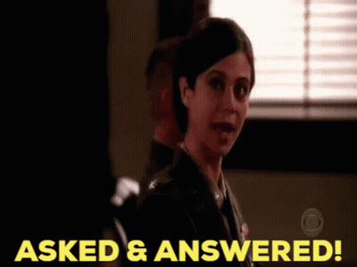 A Woman In A Military Uniform Is Standing In Front Of A Window And Says Asked And Answered GIF