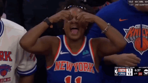 A Woman In A New York Jersey Covers Her Eyes GIF