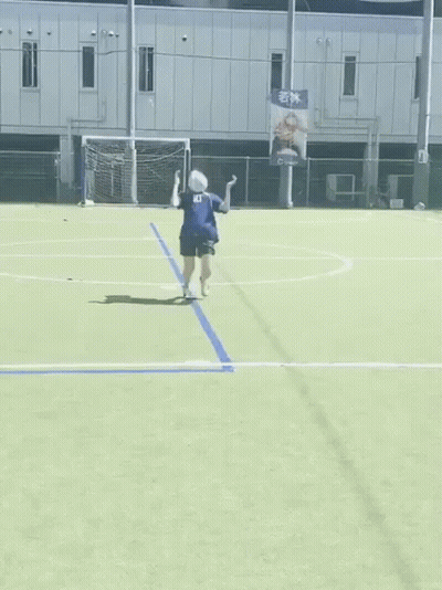 A Woman In A Number 10 Jersey Is Kicking A Soccer Ball GIF