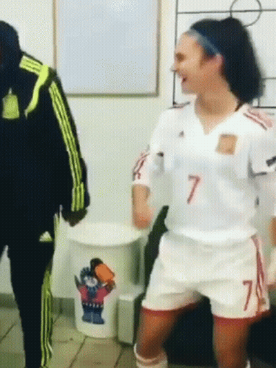 A Woman In A Number 7 Jersey Is Dancing GIF