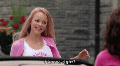 A Woman In A Pink Cardigan Is Talking To Another Woman In A Pink Shirt That Says I Know Right GIF