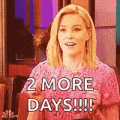 A Woman In A Pink Dress Is Saying `` 2 More Days !! '' GIF