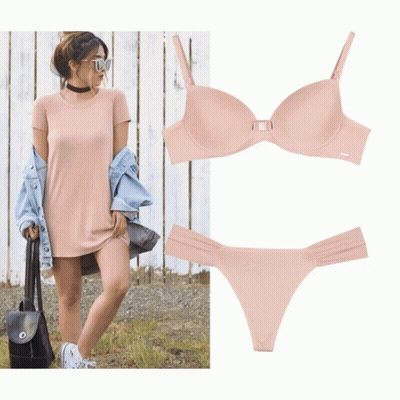 A Woman In A Pink Dress Is Standing Next To A Bra And Thong GIF