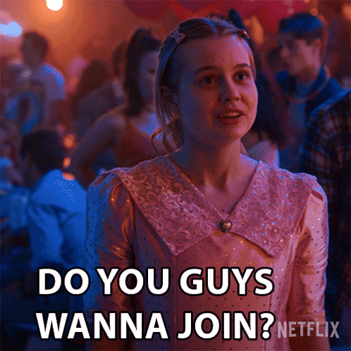 A Woman In A Pink Dress Says Do You Guys Wanna Join Netflix GIF