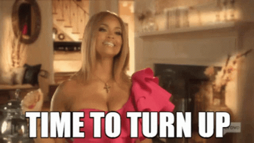 A Woman In A Pink Dress With The Words Time To Turn Up GIF