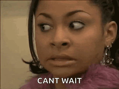 A Woman In A Pink Fur Coat Is Making A Funny Face And Says Cant Wait . GIF