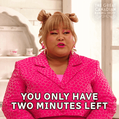 A Woman In A Pink Leopard Print Jacket Says You Only Have Two Minutes Left GIF