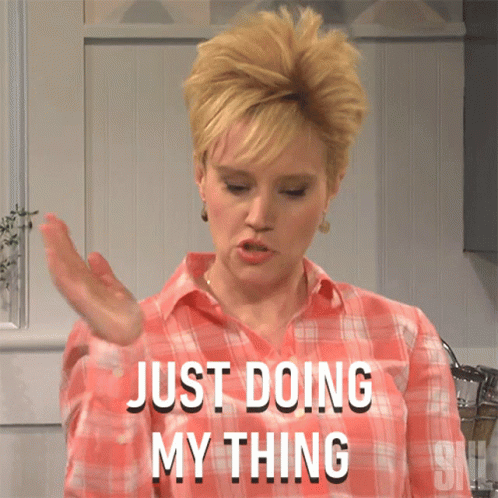 A Woman In A Pink Plaid Shirt Is Saying Just Doing My Thing GIF