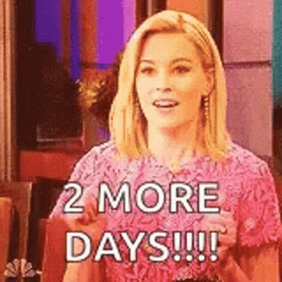 A Woman In A Pink Shirt Is Saying `` 2 More Days !! '' GIF