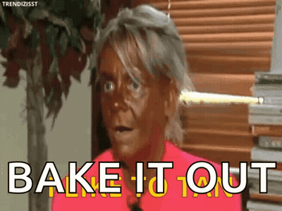 A Woman In A Pink Shirt Is Saying " Bake It Out " GIF