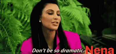 A Woman In A Pink Shirt Is Saying " Don 'T Be So Dramatic " GIF