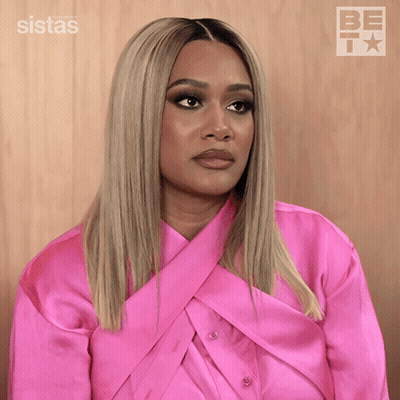 A Woman In A Pink Shirt Is Saying Never Heard Of It GIF