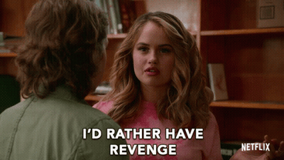 A Woman In A Pink Shirt Says I 'D Rather Have Revenge While Talking To A Man GIF