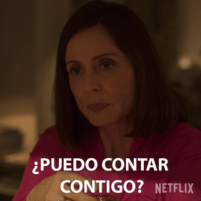 A Woman In A Pink Shirt Says " Puedo Contar Contigo " In Spanish GIF