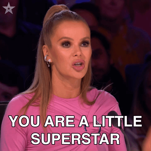 A Woman In A Pink Shirt Says You Are A Little Superstar GIF