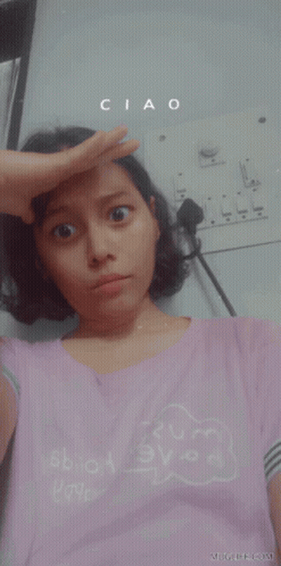 A Woman In A Pink Shirt With The Word Nope On It GIF