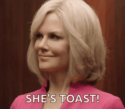 A Woman In A Pink Suit Says She 'S Toast . GIF