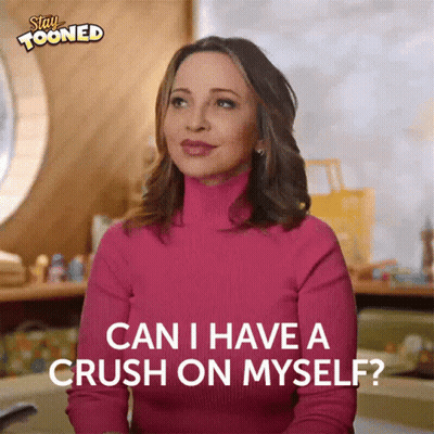 A Woman In A Pink Sweater Is Asking If She Has A Crush On Herself GIF