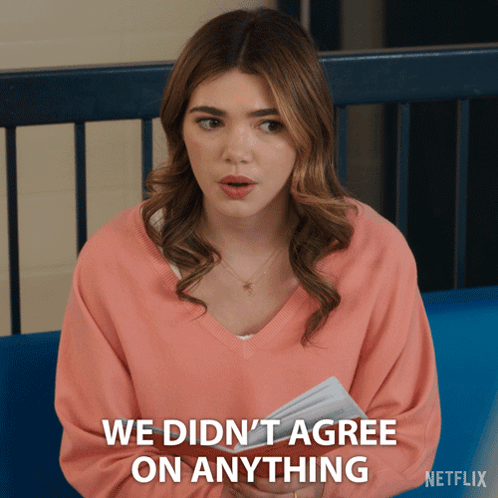 A Woman In A Pink Sweater Says " We Did N't Agree On Anything " While Holding A Piece Of Paper GIF