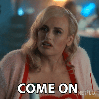 A Woman In A Pink Sweater With The Words Come On Netflix On Her Chest GIF
