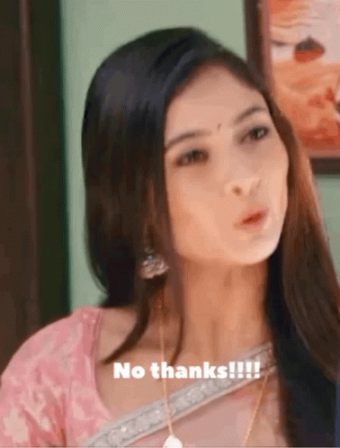 A Woman In A Pink Top Is Saying No Thanks !! GIF
