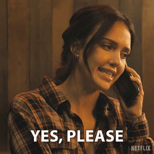 A Woman In A Plaid Shirt Is Talking On A Cell Phone And The Words Yes Please Are Above Her GIF