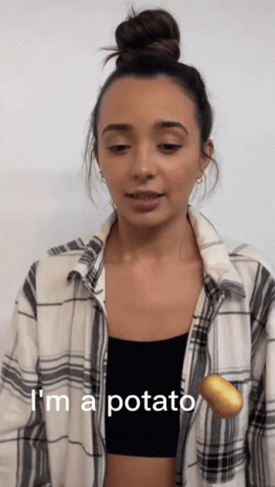A Woman In A Plaid Shirt Says " I 'M A Potato " Next To A Potato GIF