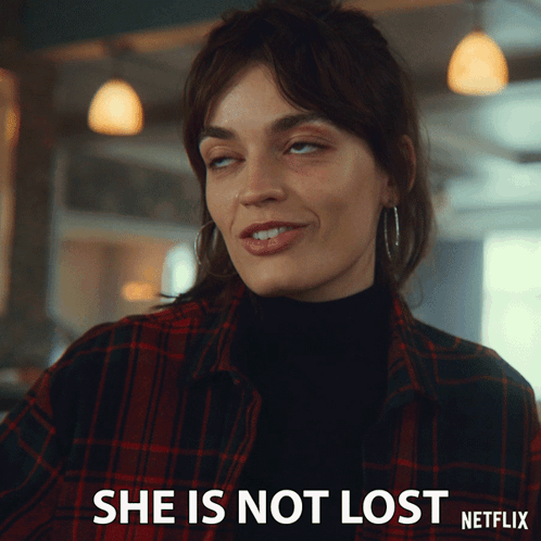 A Woman In A Plaid Shirt Says She Is Not Lost On A Netflix Ad GIF