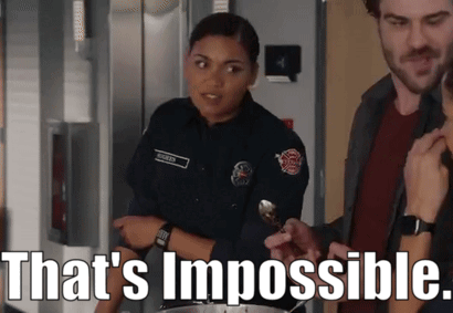 A Woman In A Police Uniform Is Holding A Spoon And Says That 'S Impossible .. GIF