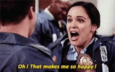 A Woman In A Police Uniform Is Screaming At A Man In A Police Uniform . GIF