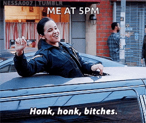 A Woman In A Police Uniform Is Sitting In The Back Of A Limousine . GIF