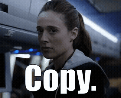A Woman In A Ponytail Is Looking At The Camera With The Words Copy Written In White GIF