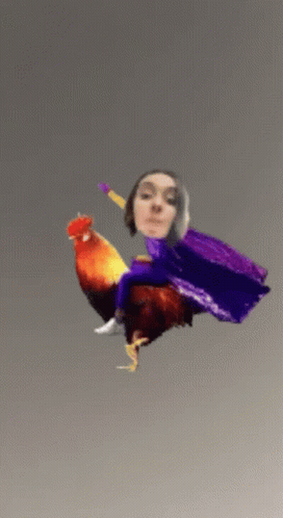 A Woman In A Purple Cape Is Riding A Colorful Rooster GIF