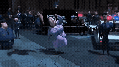 A Woman In A Purple Dress Is Dancing In Front Of A Police Van That Says Animal Control GIF